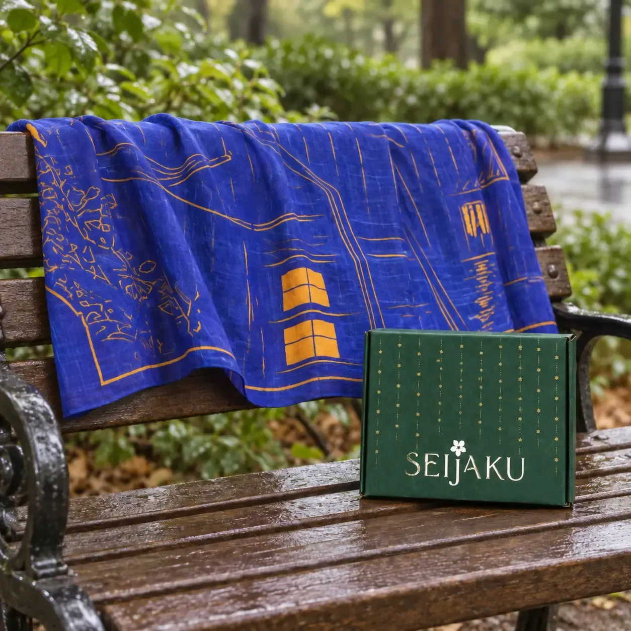 Seijaku textiles arranged in a quiet editorial still life with warm natural tones.